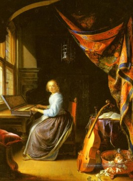Une femme jouant un clavicorde Golden Age Gerrit Dou Peinture à l'huile